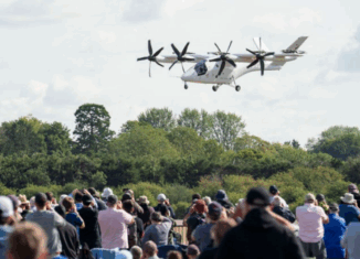 First Piloted Airport-to-Airport Flight for Winged Tilt-Rotor eVTOL